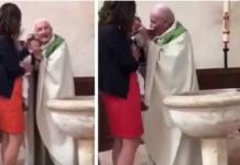 Un sacerdote abofetea a un niño para que deje de llorar mientras lo bautiza
