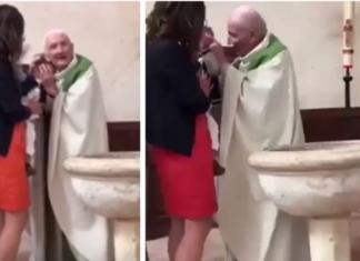Un sacerdote abofetea a un niño para que deje de llorar mientras lo bautiza