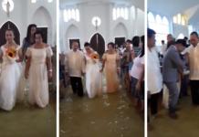 Una pareja camina al altar con la iglesia inundada